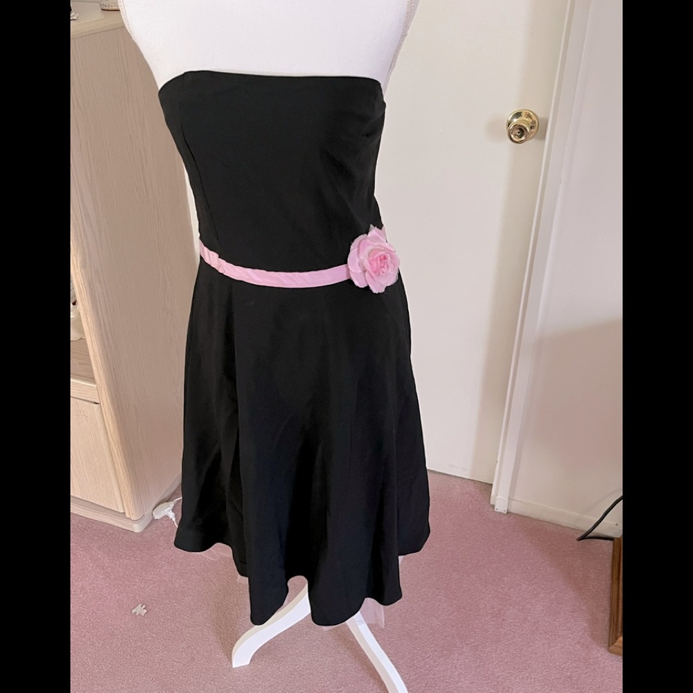 Strapless black dress with pink belt